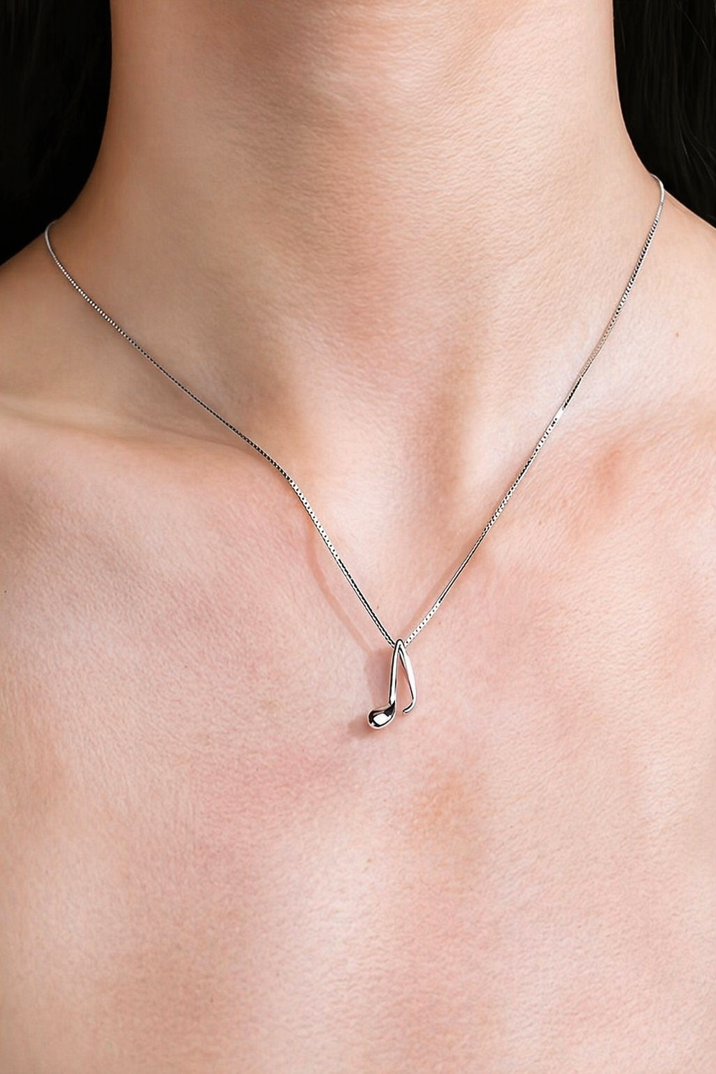 Lupita -  Dames minimalistische muzieknoot ketting – Verzilverde afwerking - Alle seizoenen